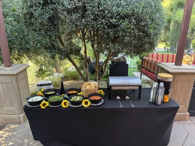 Elegant taco bar catering setup in Temecula Wine Country featuring fresh toppings, homemade salsas, and premium ingredients prepared for guests.