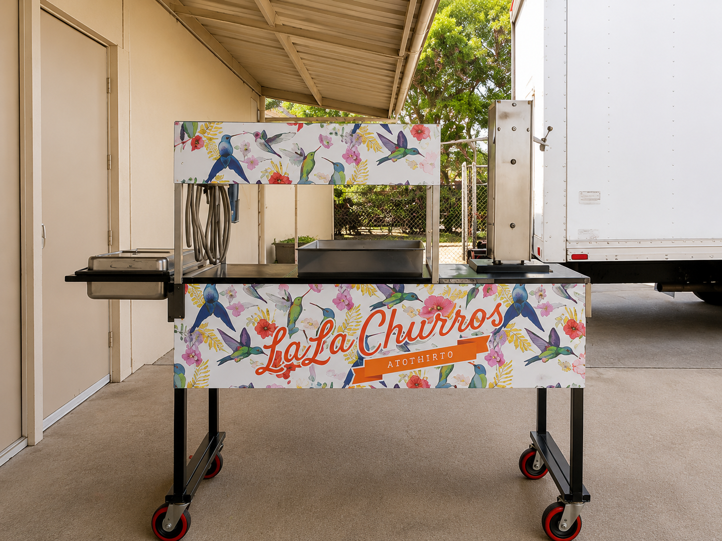 Disney recipe churro cart serving fresh cinnamon sugar churros during a birthday celebration at Friendship Auditorium in Los Angeles, California. Warm churros are prepared fresh on-site as an interactive dessert catering experience.