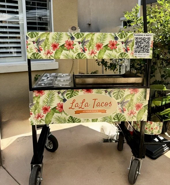 Custom hummingbird wrapped taco catering cart set up for a luxury event at a private estate in Riverside California.