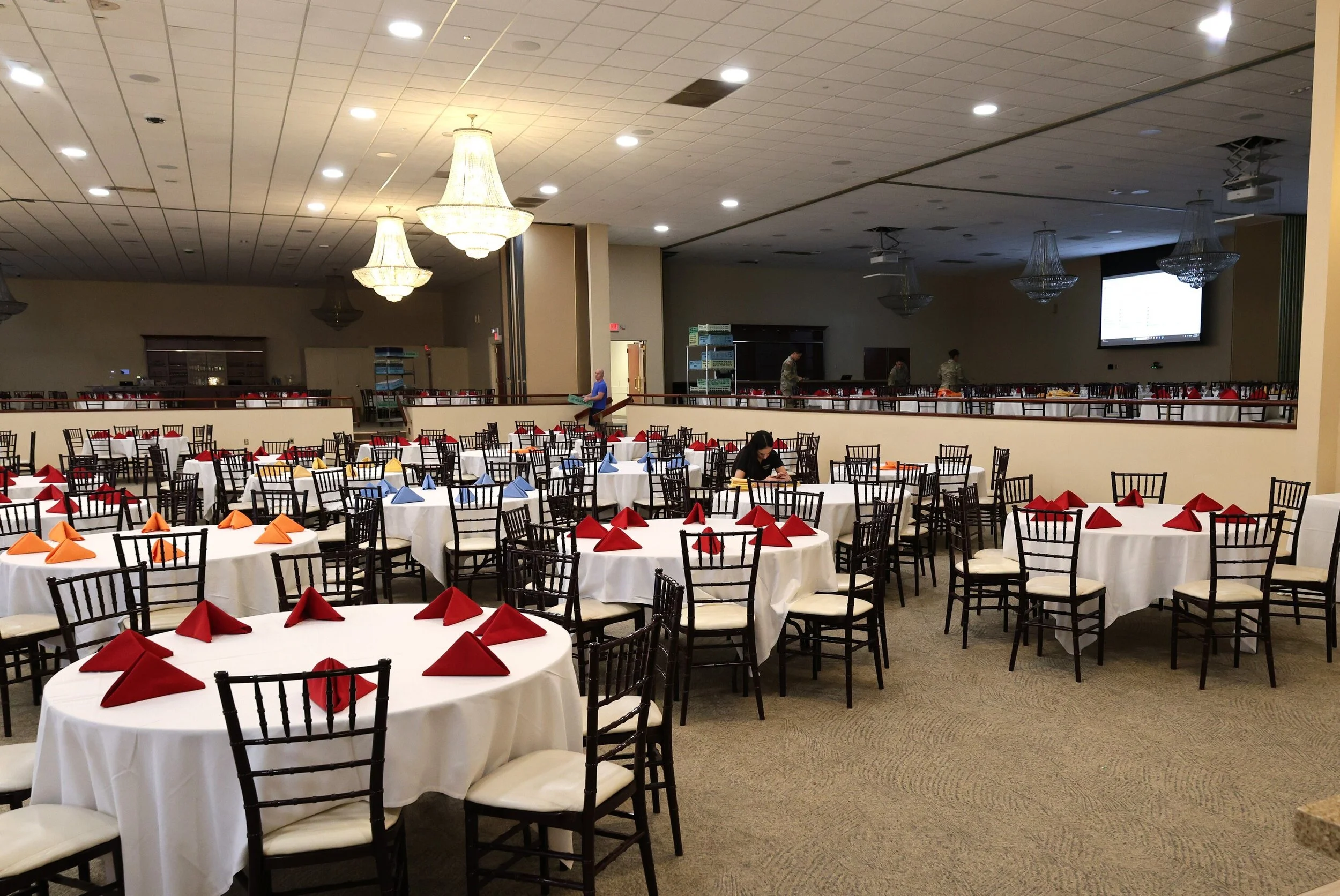 Large ballroom fully staged for enterprise corporate taco catering, featuring LaLa Tacos zero-line tableside service for large events.