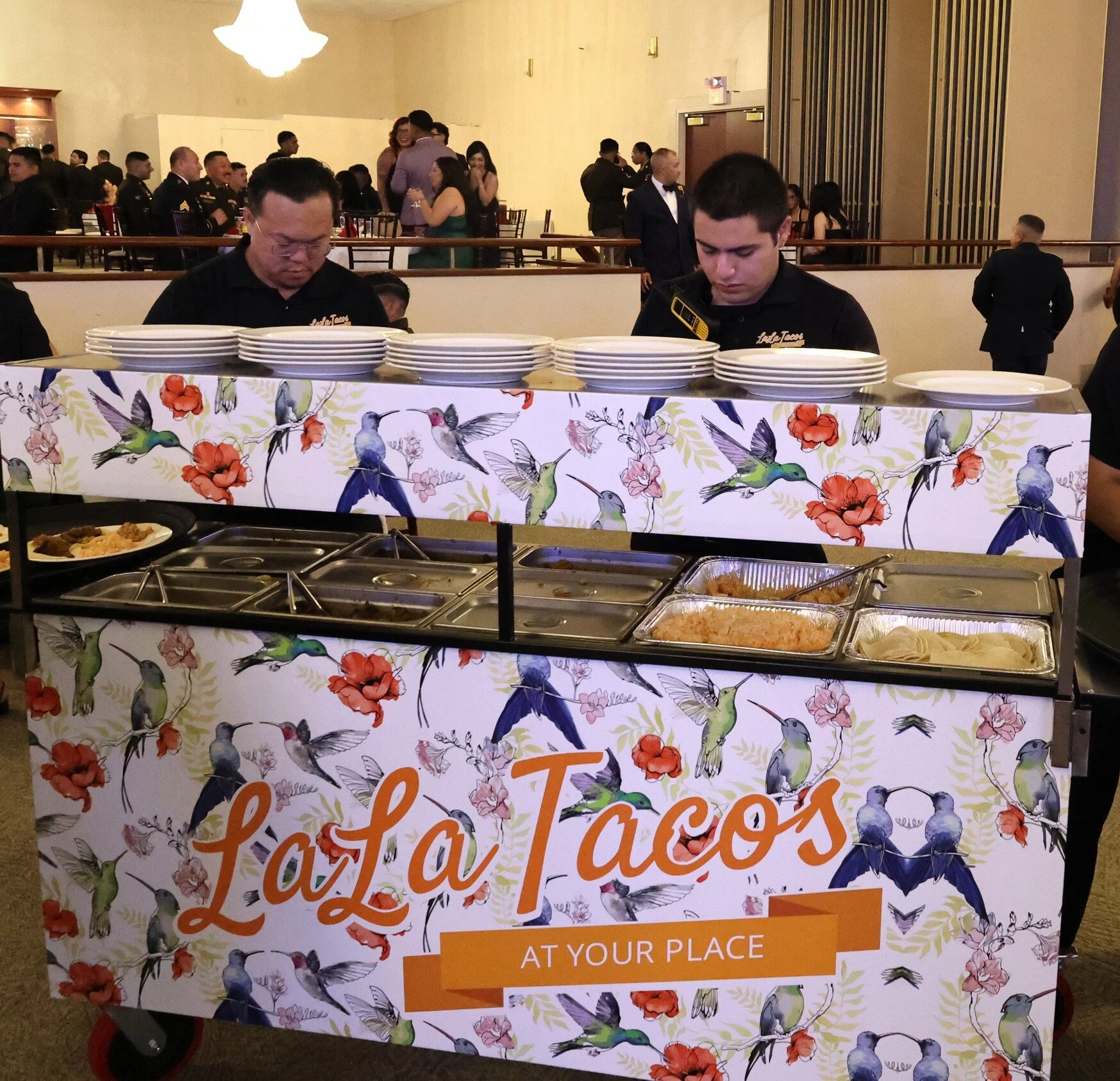 Custom propaneless indoor taco catering cart operated by LaLa Tacos staff during a large corporate and military event.