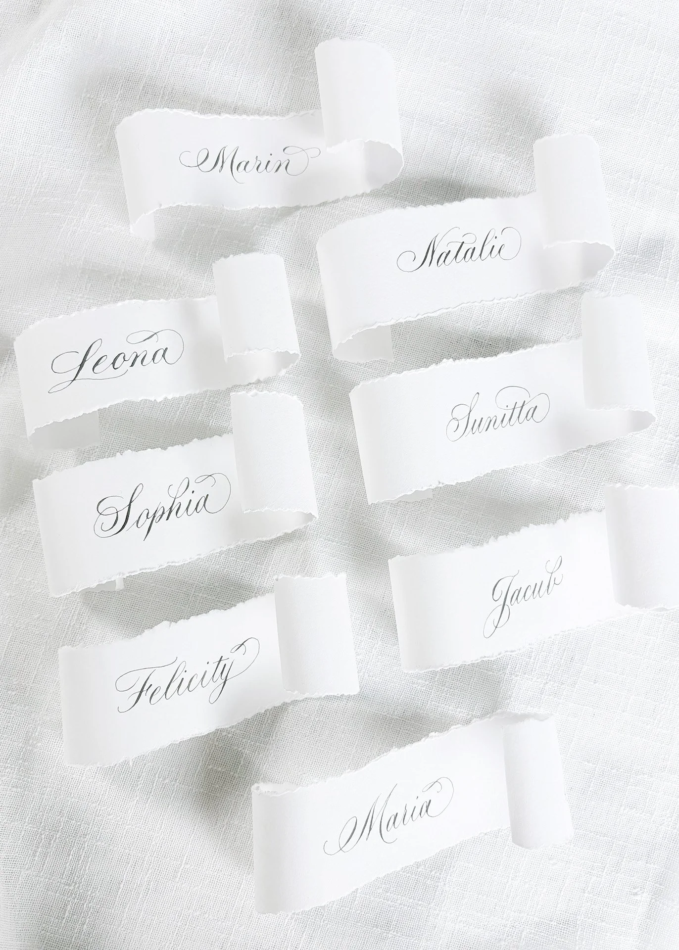Scroll place cards with calligraphy names