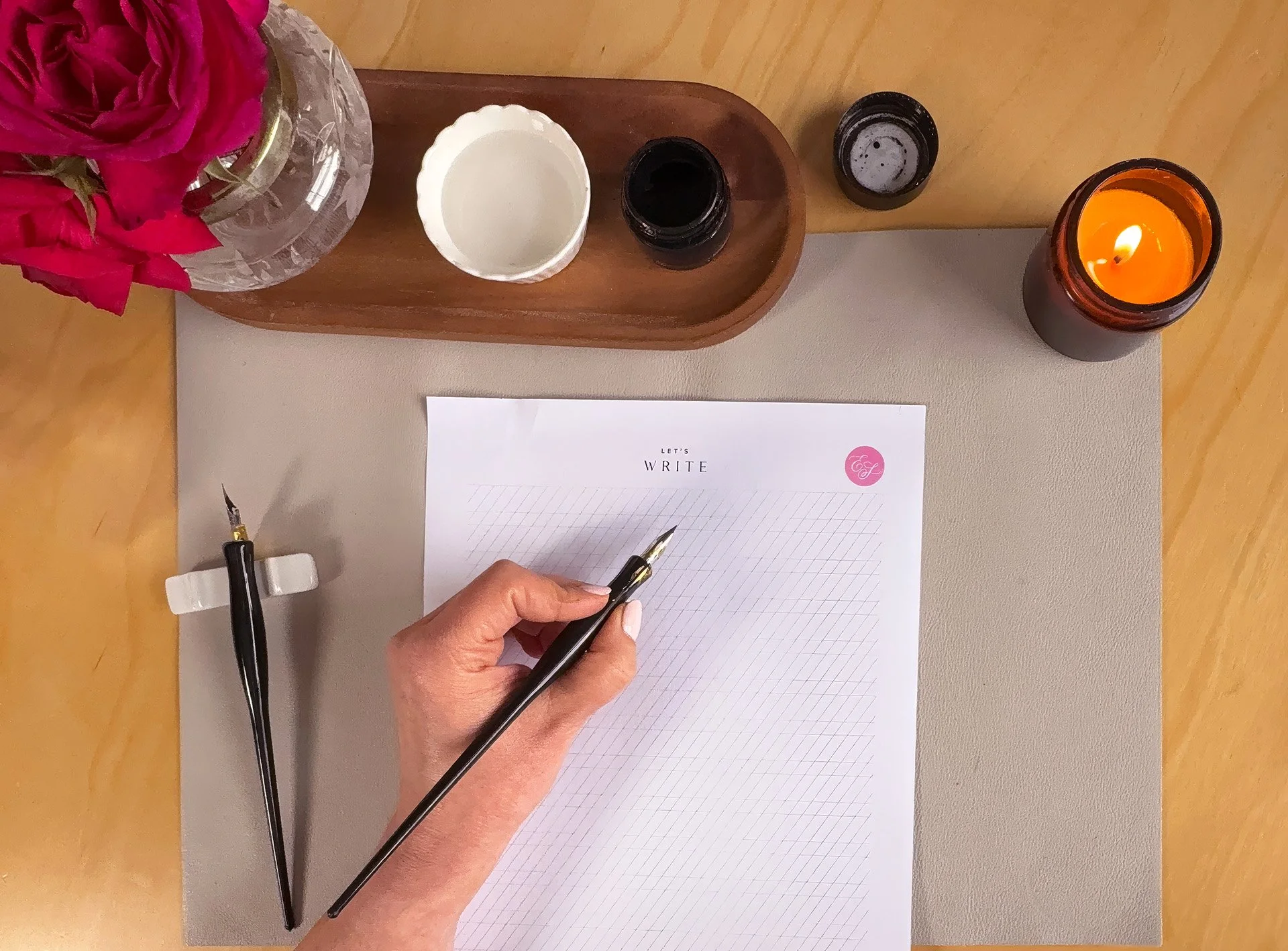 left hand calligraphy setup - a hand writing with straight pen holder