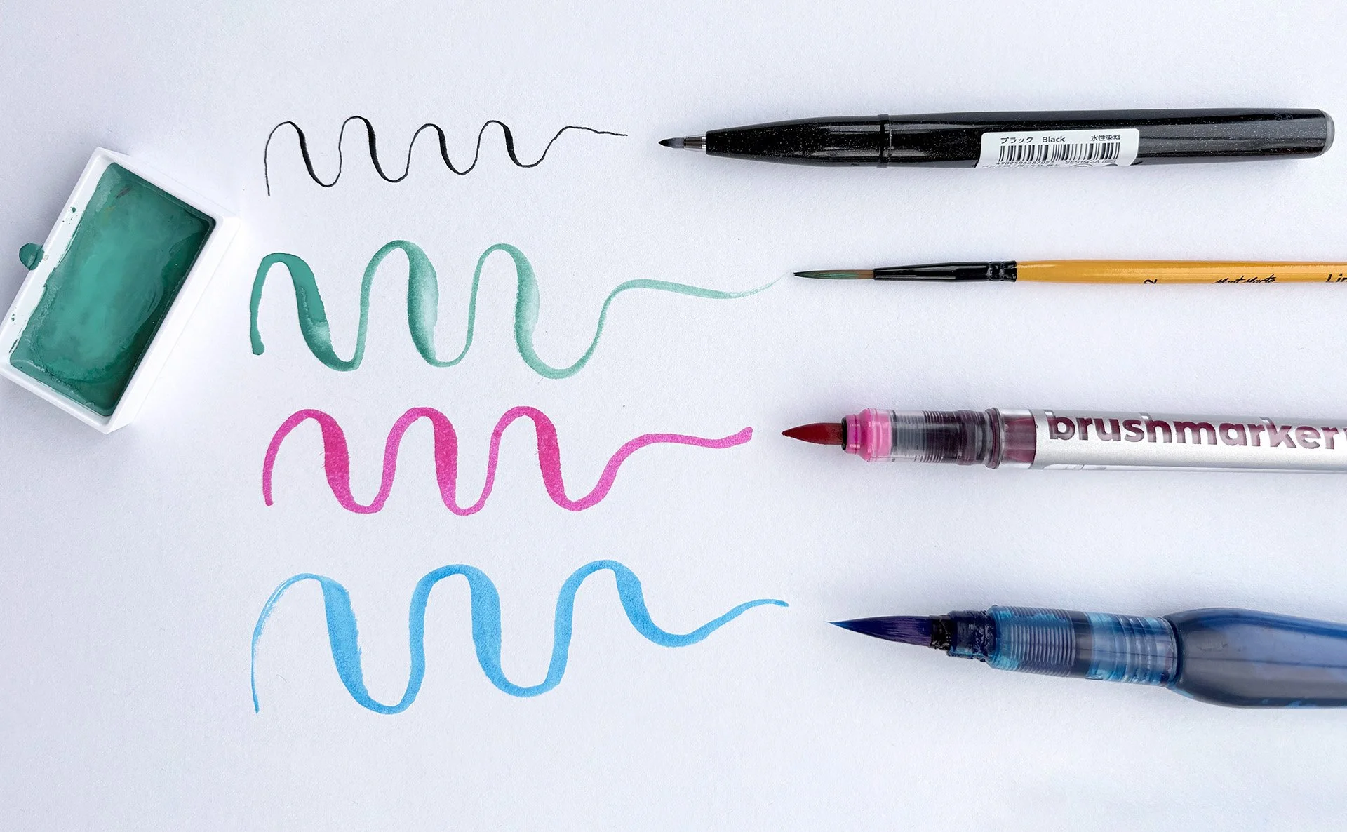 Examples of different brush pens and the strokes they produce for calligraphy.