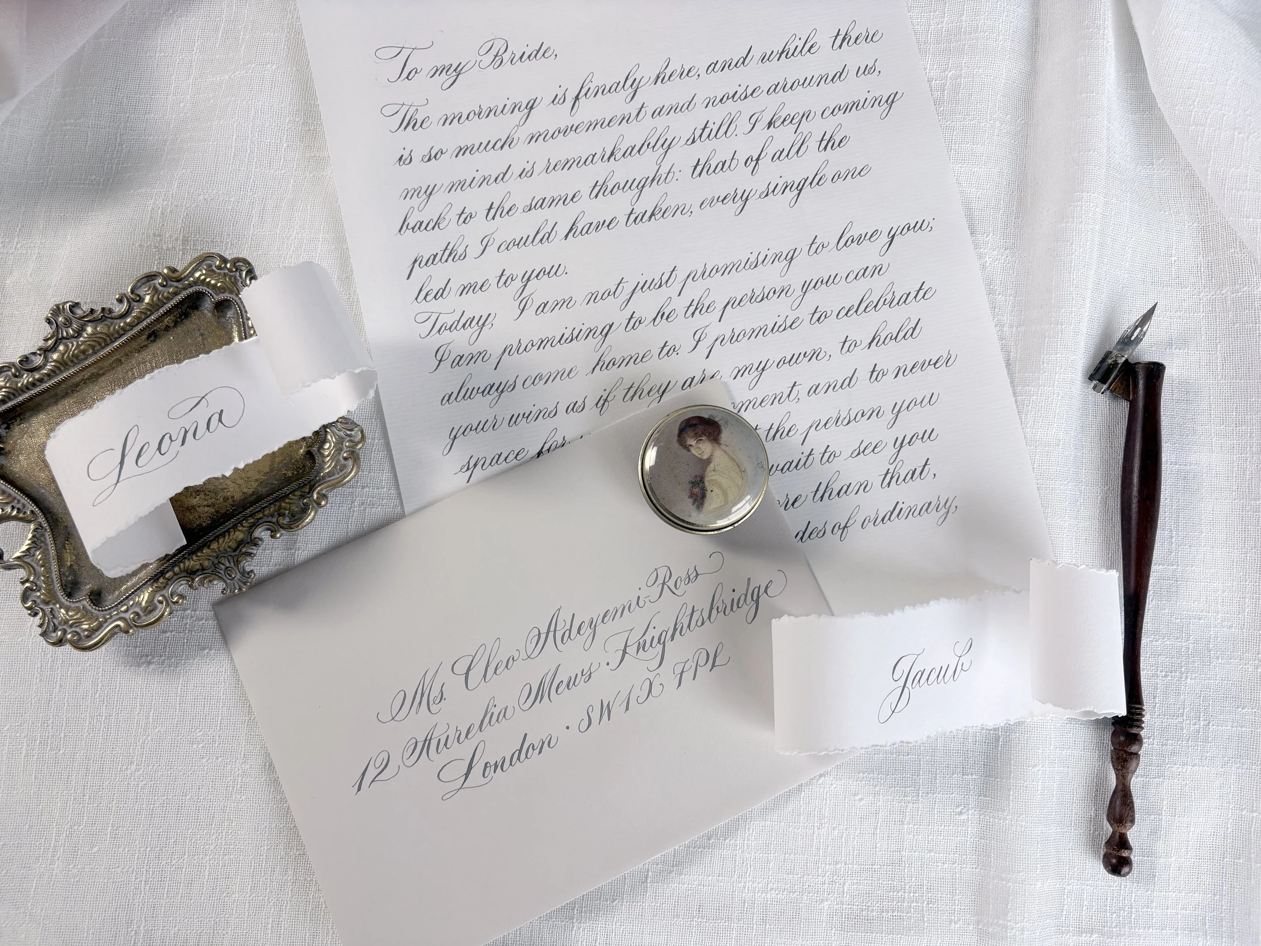 A love letter and envelope written with a pointed pen in Copperplate style calligraphy