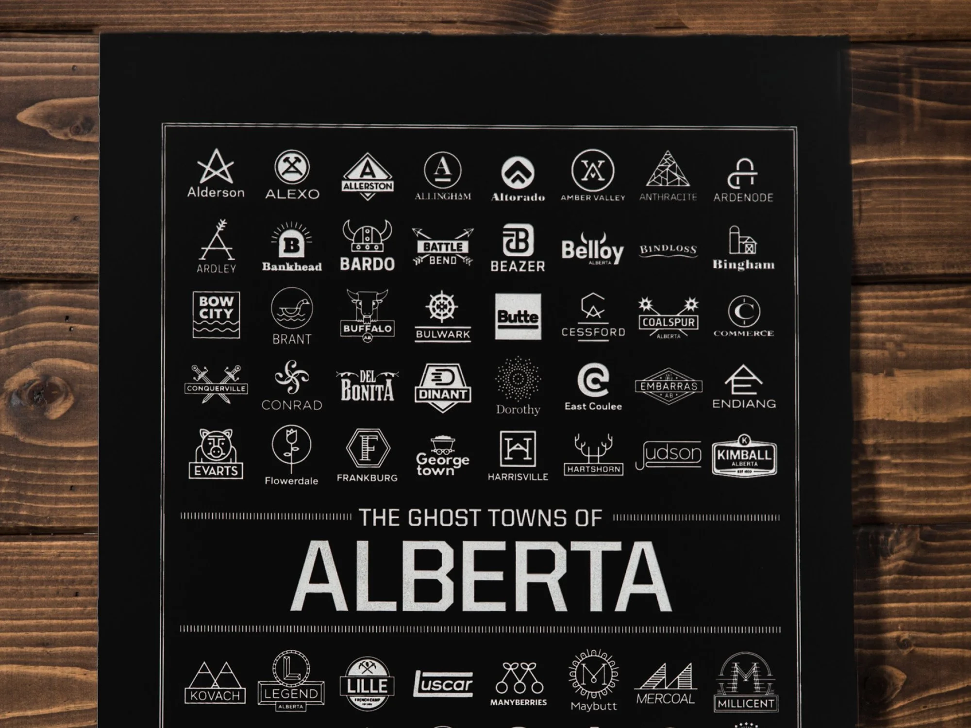 Black version of context-driven community logo design and identity study for abandoned prairie towns in Alberta by Edmonton graphic designer Nigel Hood