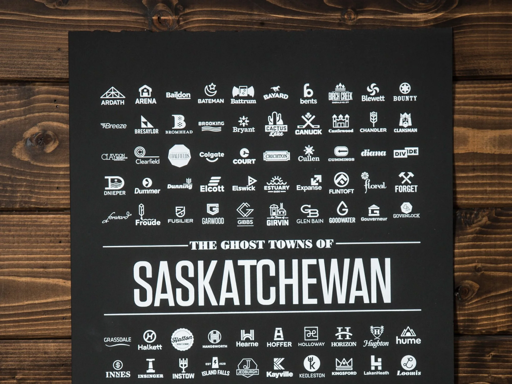 Black version of context-driven community logo design and identity study for abandoned prairie towns in Saskatchewan by Edmonton graphic designer Nigel Hood