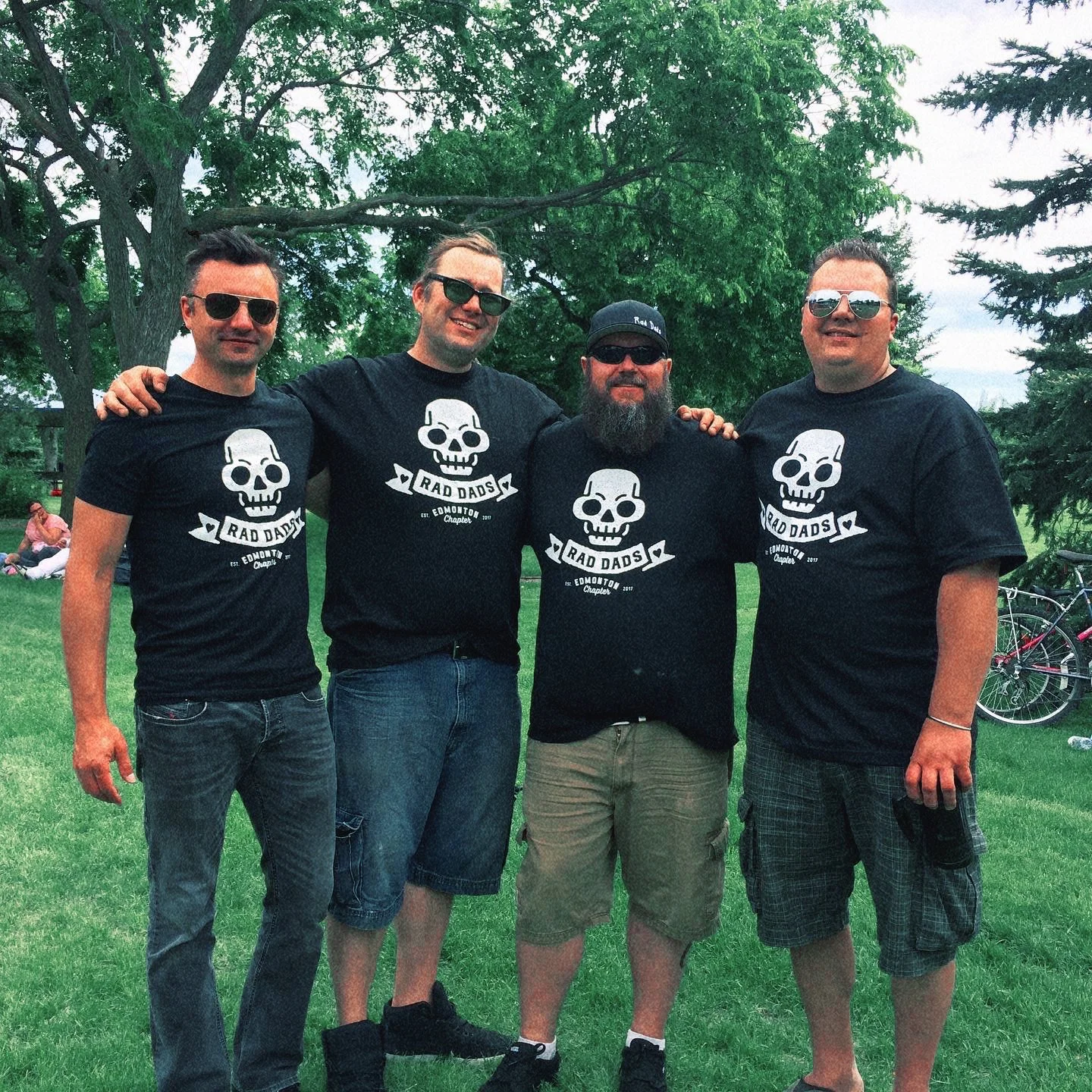 Rad Dads Edmonton founder Kristian Basaraba with crew wearing primary logo on shirt design by Edmonton graphic designer Nigel Hood