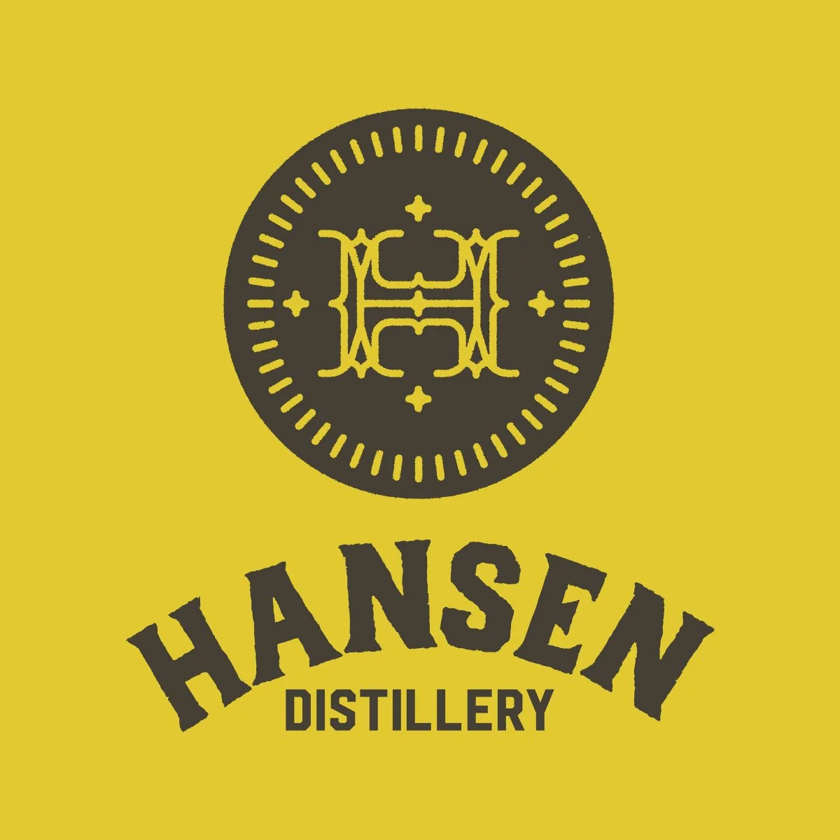 Black version logo on gold for Hansen Distillery by Edmonton graphic designer Nigel Hood