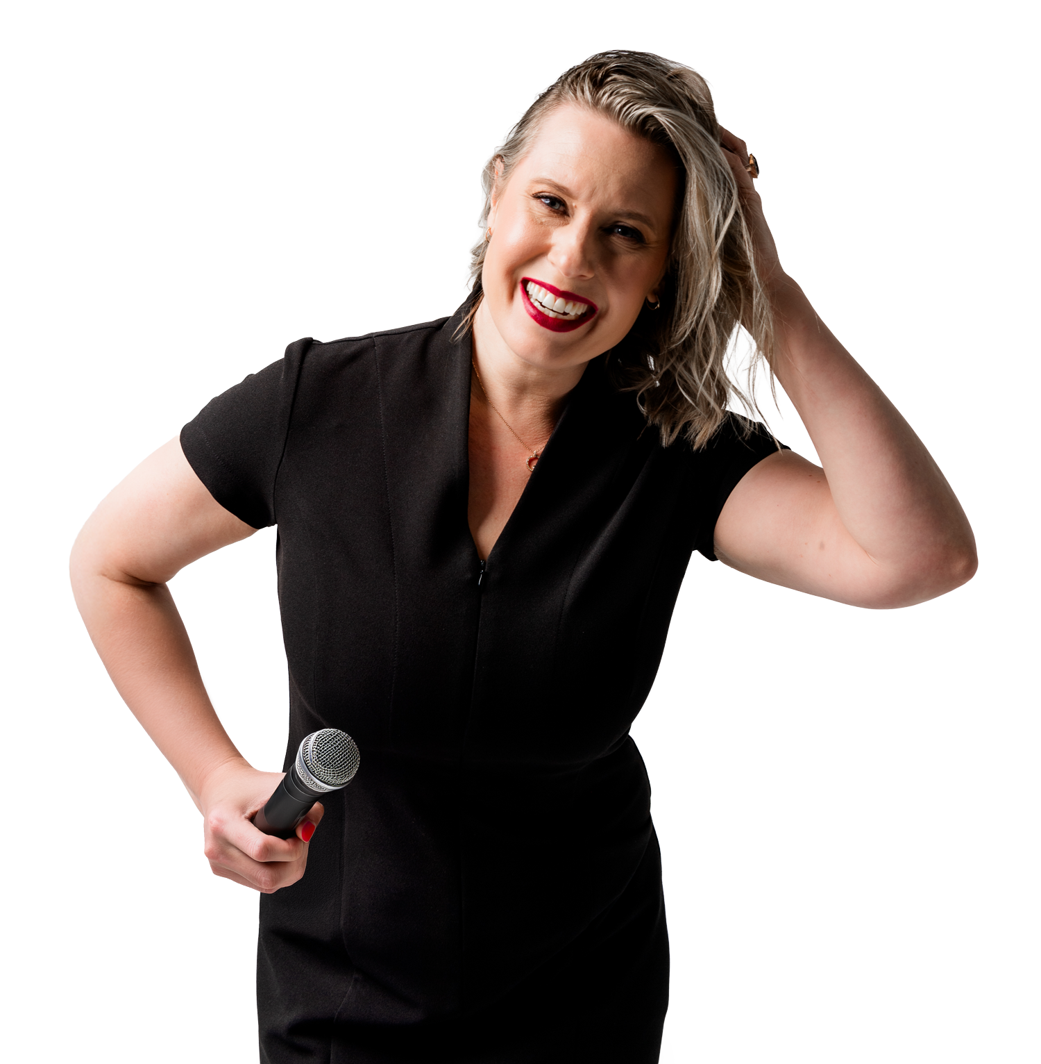 Sally Prosser wearing a black dress, smiling, holding a microphone, and posing with one hand on her head.