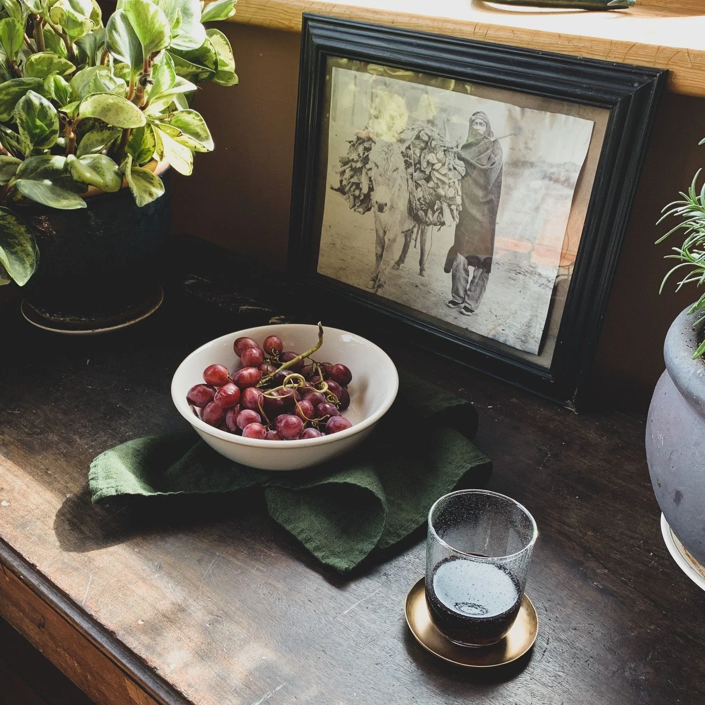 Natural materials make a space feel luxurious in its own way. A simple linen tea towel, recycled glass and a brass coaster feel like little heirlooms.