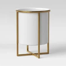 White Champagne bucket with brass feet.jpeg
