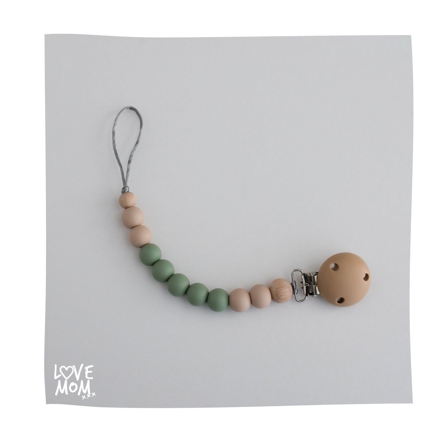 Our silicone dummy clips (soother holders) are a brilliant solution to stop your little ones from losing their dummies. Made from silicone beads with two natural wooden beads our dummy clips not only stop your little ones from dropping their dummies 