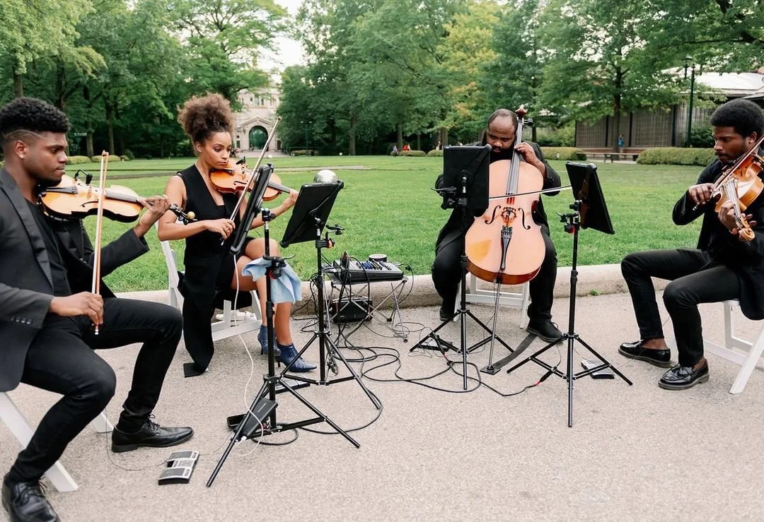 Edward W. Hardy (violin) and chamber quartet members performing