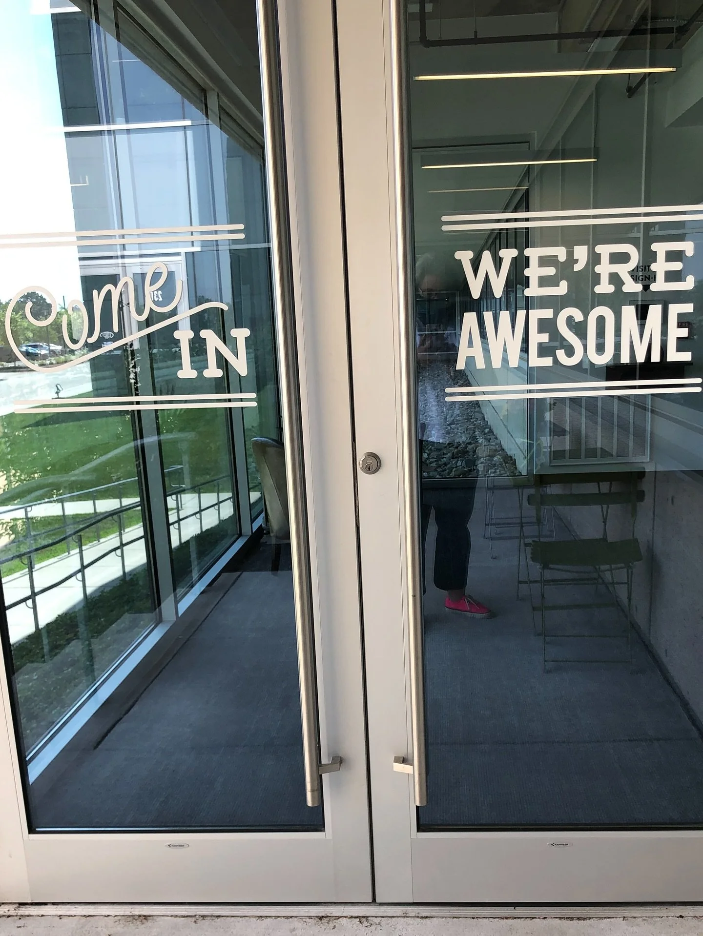 I took this photo as I walked into WFM on my last day as a team member-four years ago today. You know I cried. (You can tell it&rsquo;s me by the reflection of my shoes😂)
Everything I knew professionally was on the other side of these doors. I was t
