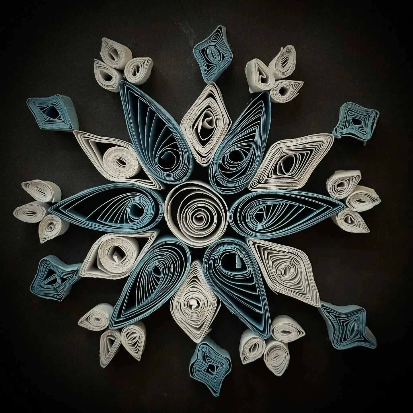 Happy winter from Matheia School! The whole school learned paper quilling and made beautiful snowflakes to display in our auditorium. #matheiaschool #paperquilling #snowflakes #smallschool #seattle #ballard #