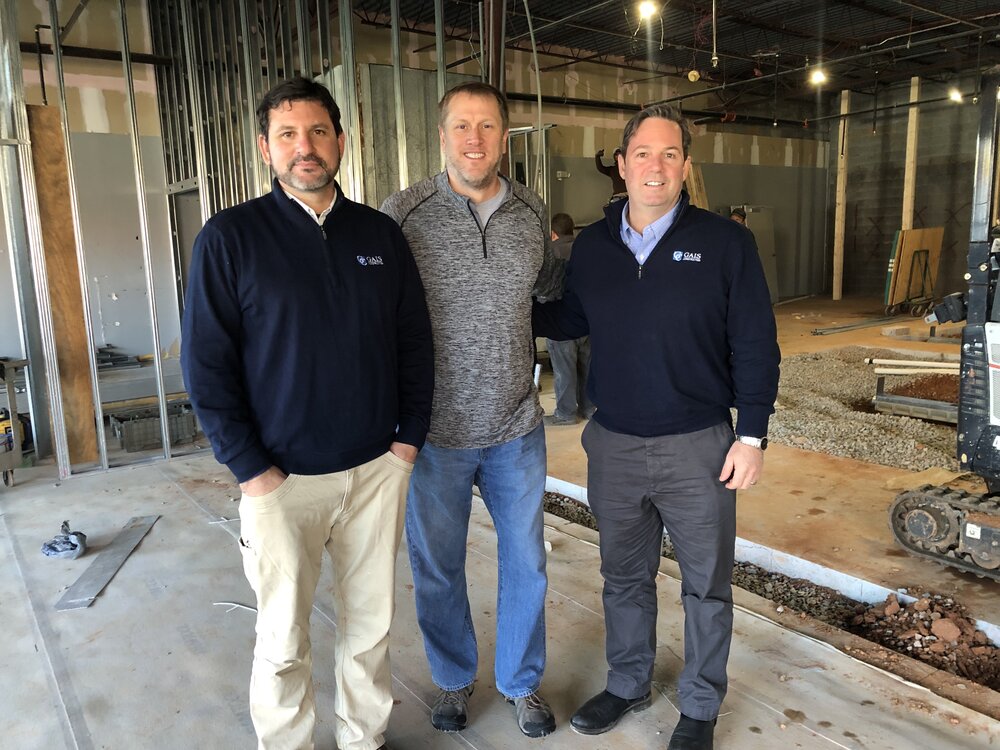 Kevin Gais, Dave Hamme and Michael Gais on the site of the future Lost Worlds Brewing.