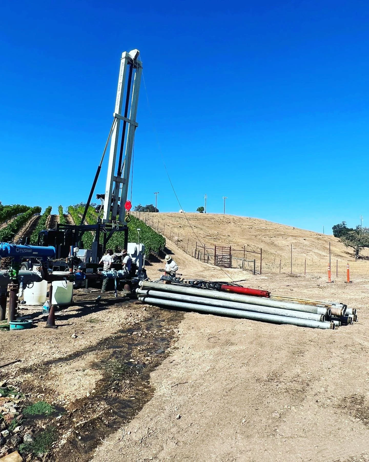 Triple stack of 6&rdquo; pipe pulled out for a vineyard. We pulled 546&rsquo; pipe out behind another company that did not use anti seize on any of the couplings. Made for a long day of fighting pipe! #tdhmfg #cleaningotherpeoplesmess #pump #pumphois