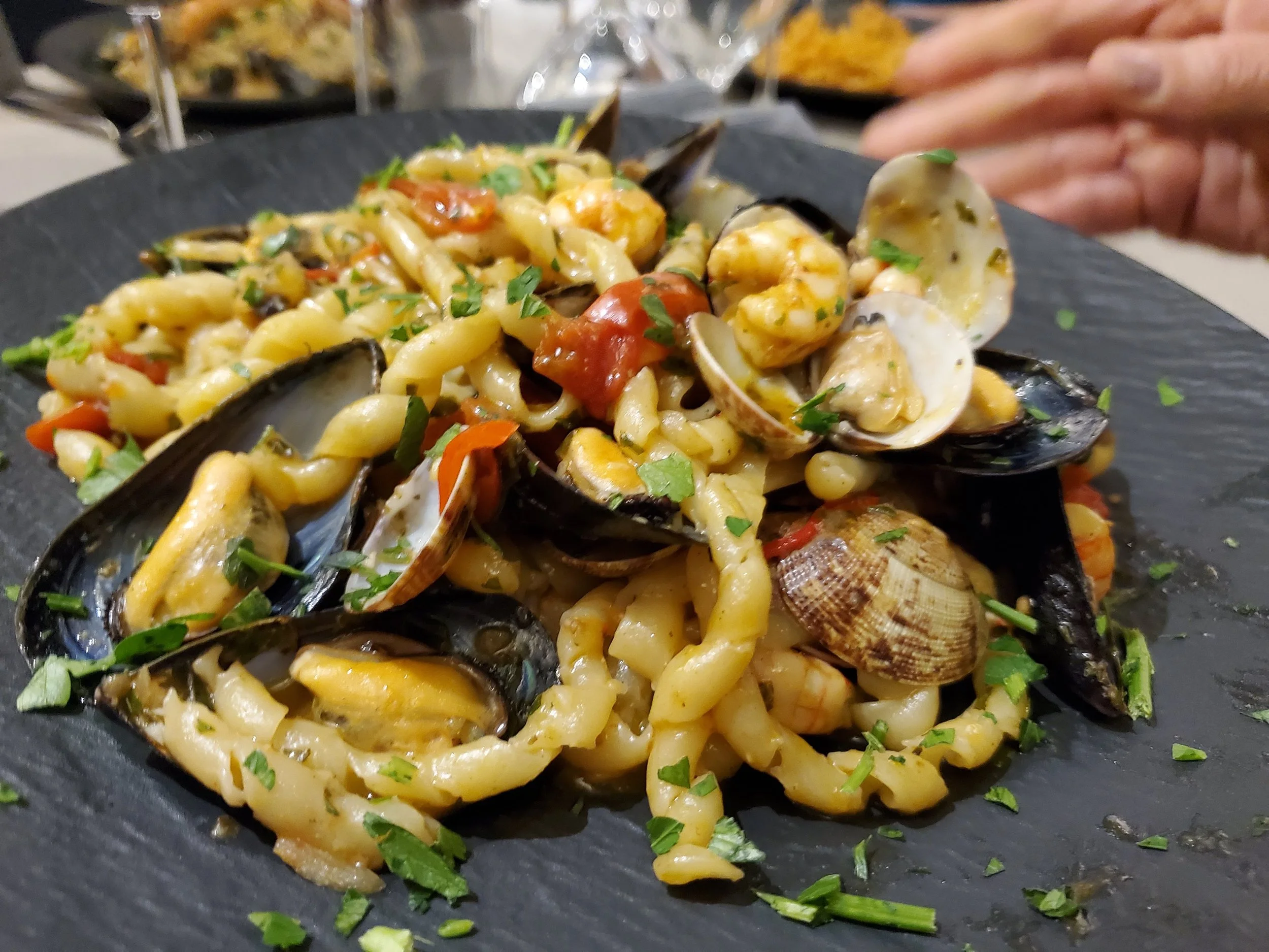 Traditional Sicilian Pasta busiate with Mixed Seafood
