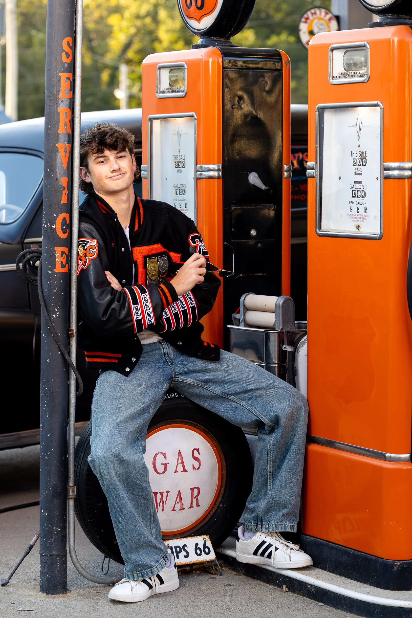 senior boy photos, retro gas station senior session, Route 66 senior pictures, varsity jacket senior photos, vintage senior photography