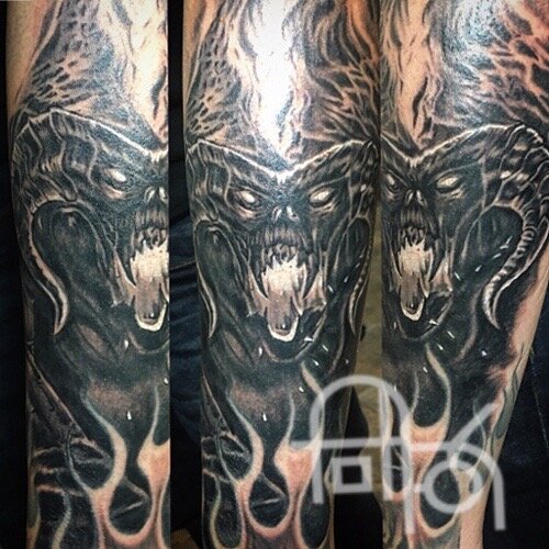 Black and Gray Horned Demon Tattoo
