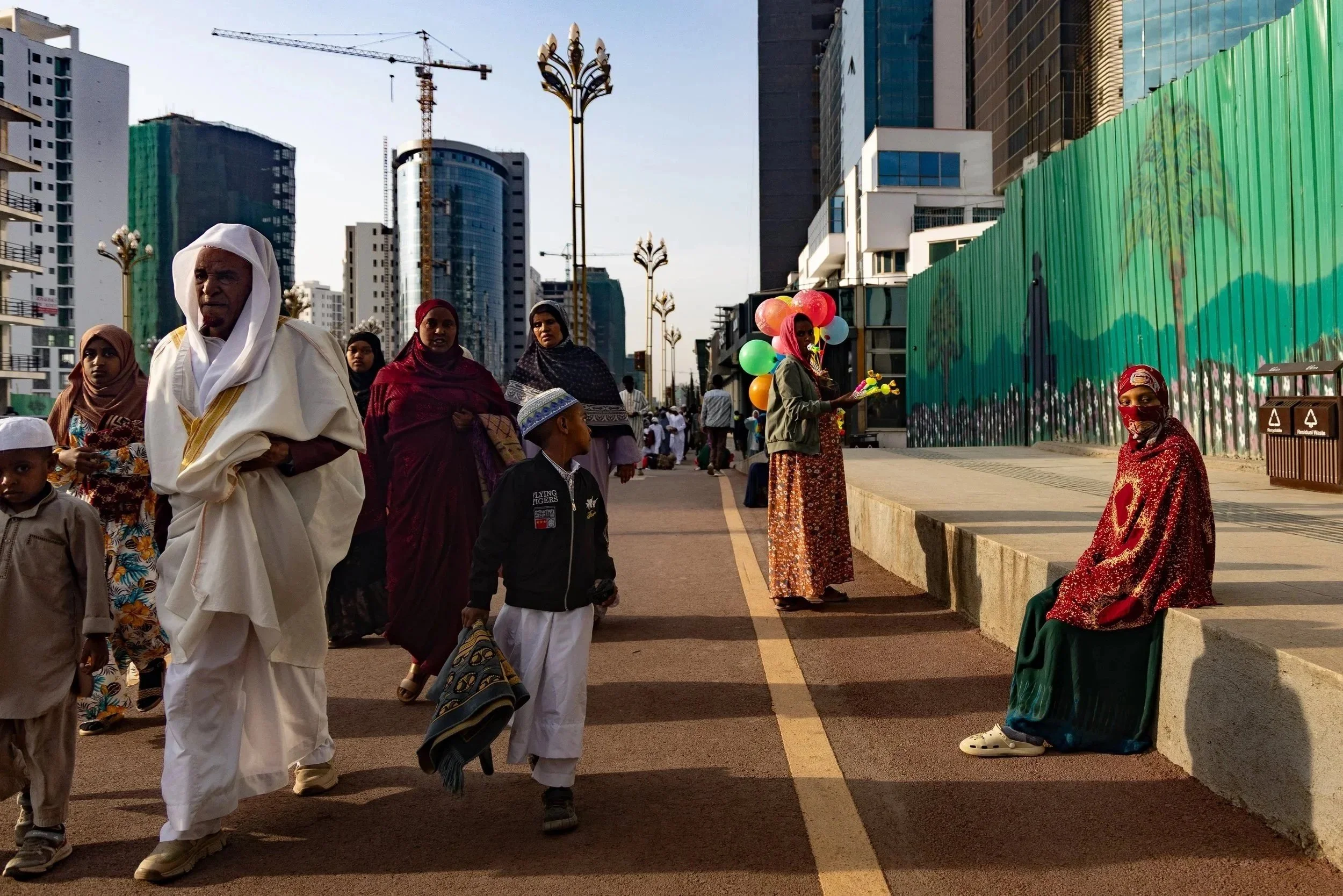  Attendees walk to Stadium in Addis Ababa, Ethiopia to pray during the celebration of Eid-al-Adha on June 5, 2025. 