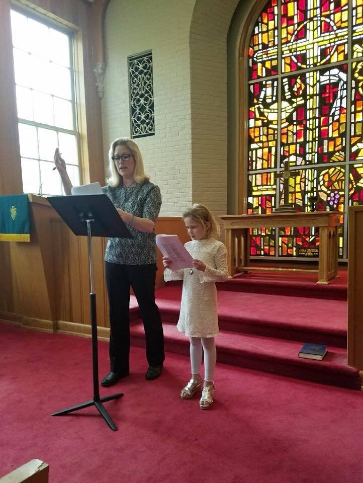  Nora helped Claire lead worship! 