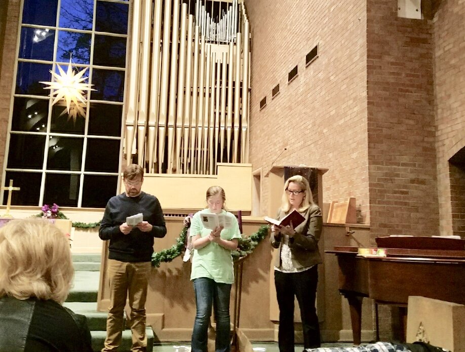  Frederick family leading during an Advent service. 