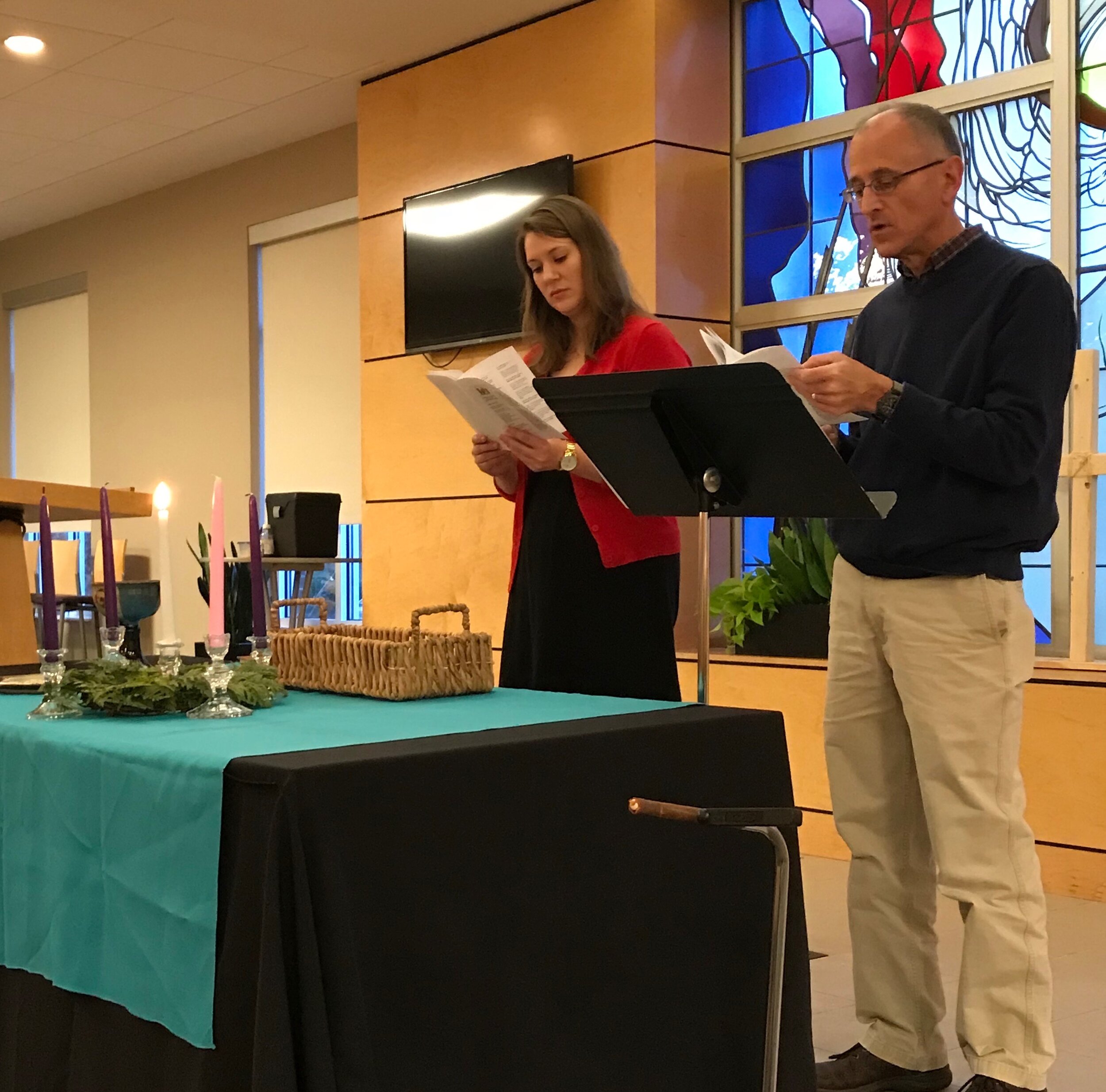  Becky Frazier and Ted Parks read Scripture for Advent. 