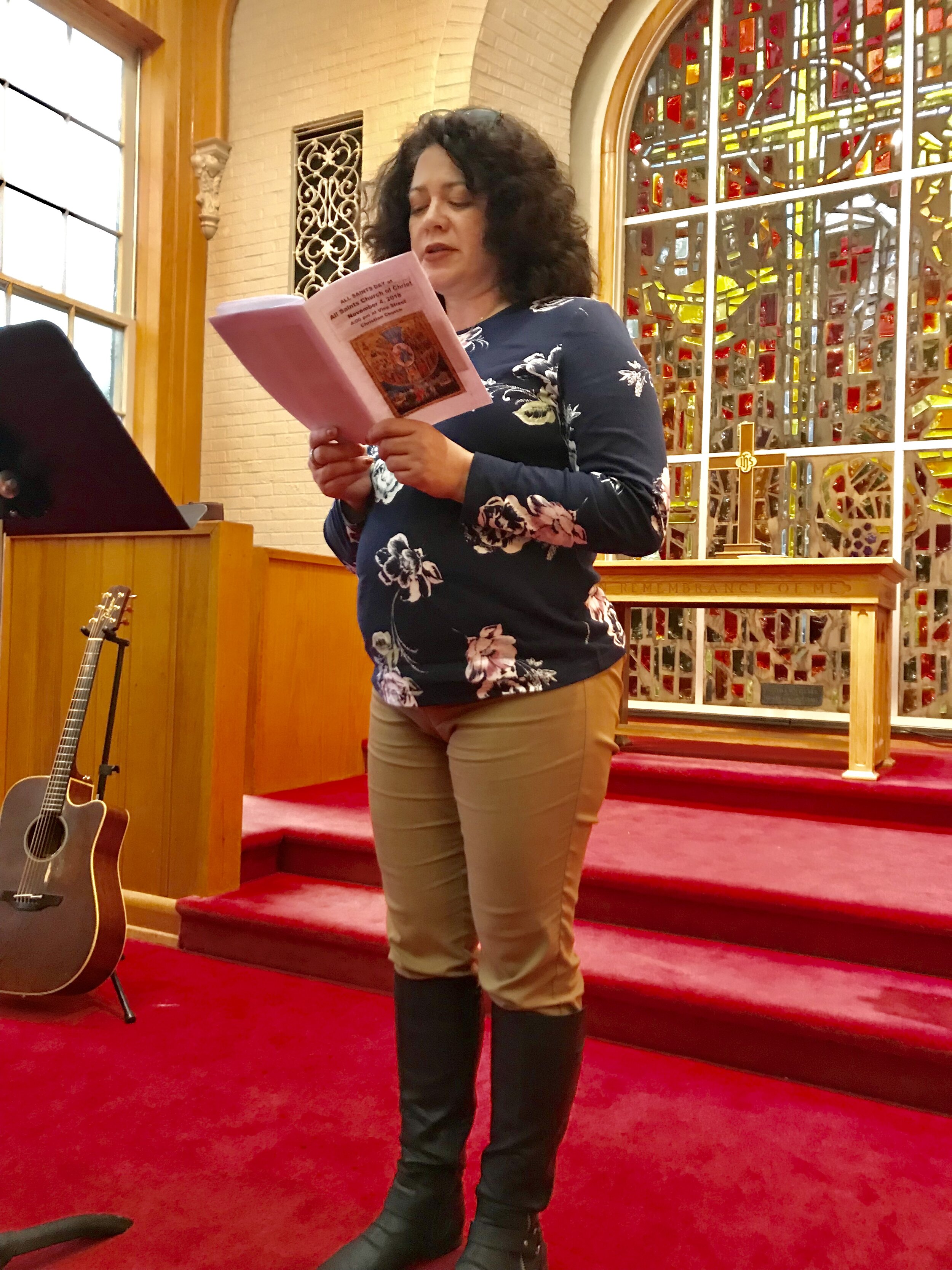  Jacquie Gonzalez reading Scripture. 