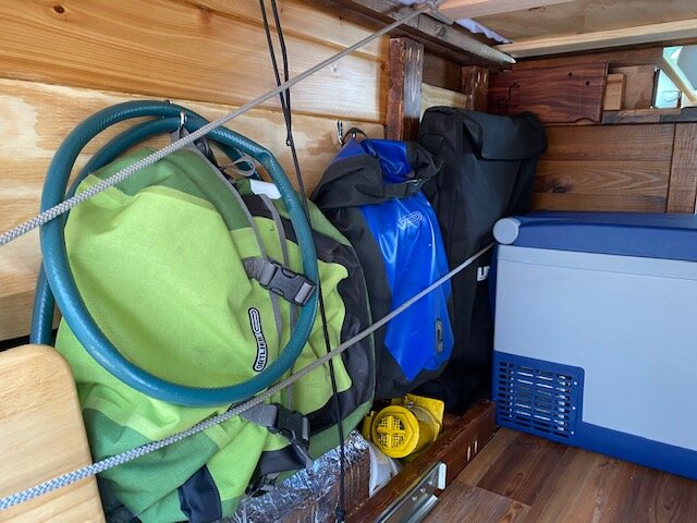  Installing hooks to hang our panniers.  