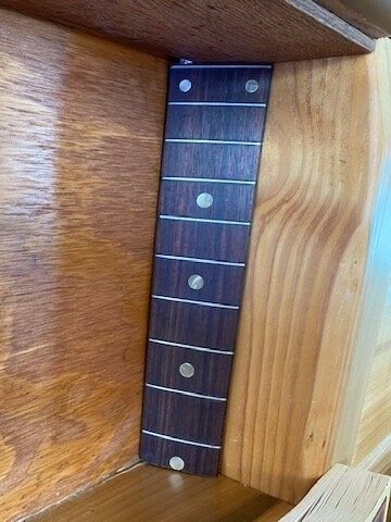  Trim, like this lovely fretboard that’s covering up some Reflectix tape.  