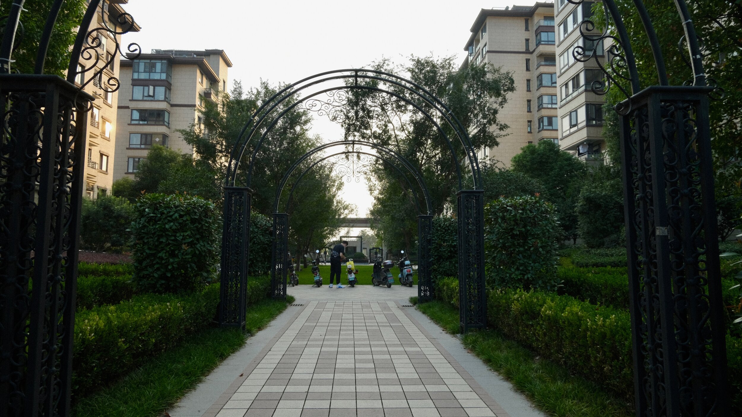  In the center of our complex are these black, iron arches. During the Lunar New Year they get wrapped in bright lights. 