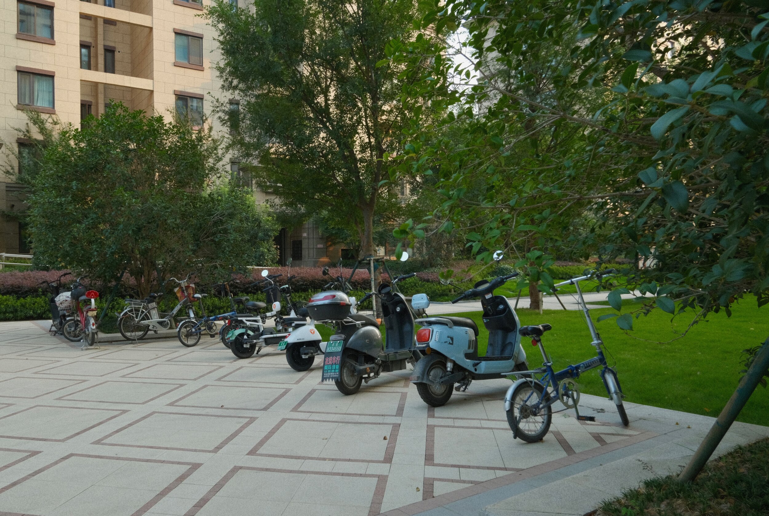  Cars aren’t allowed into the main part of our complex, but there’s plenty of open spaces for people to park their e-bikes, one of the most popular forms of transport here in Nanjing.  