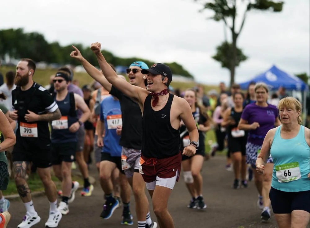 Runners starting their Sunset Festival Half marathon, marathon and &amp; 7km race