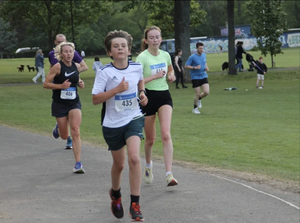 Runners charging round the Sundowner 5K route