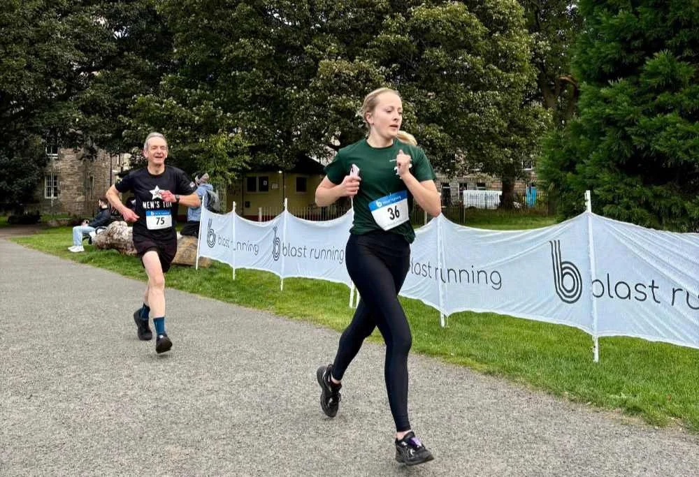Runners taking part in the Autumn Blast 5K @ The Meadows