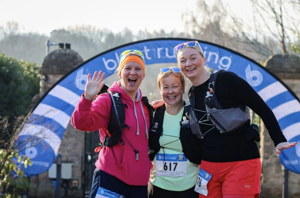 3 runners at the start of the 20 Along the Forth run in Edinburgh
