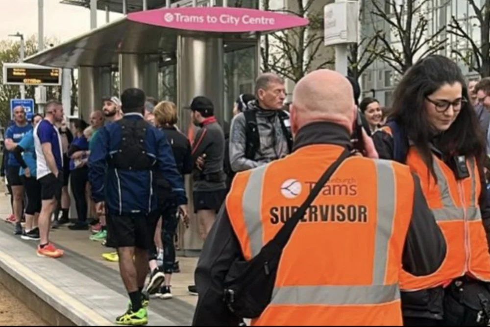 Runners waiting to be transported to the start of Race The Tram