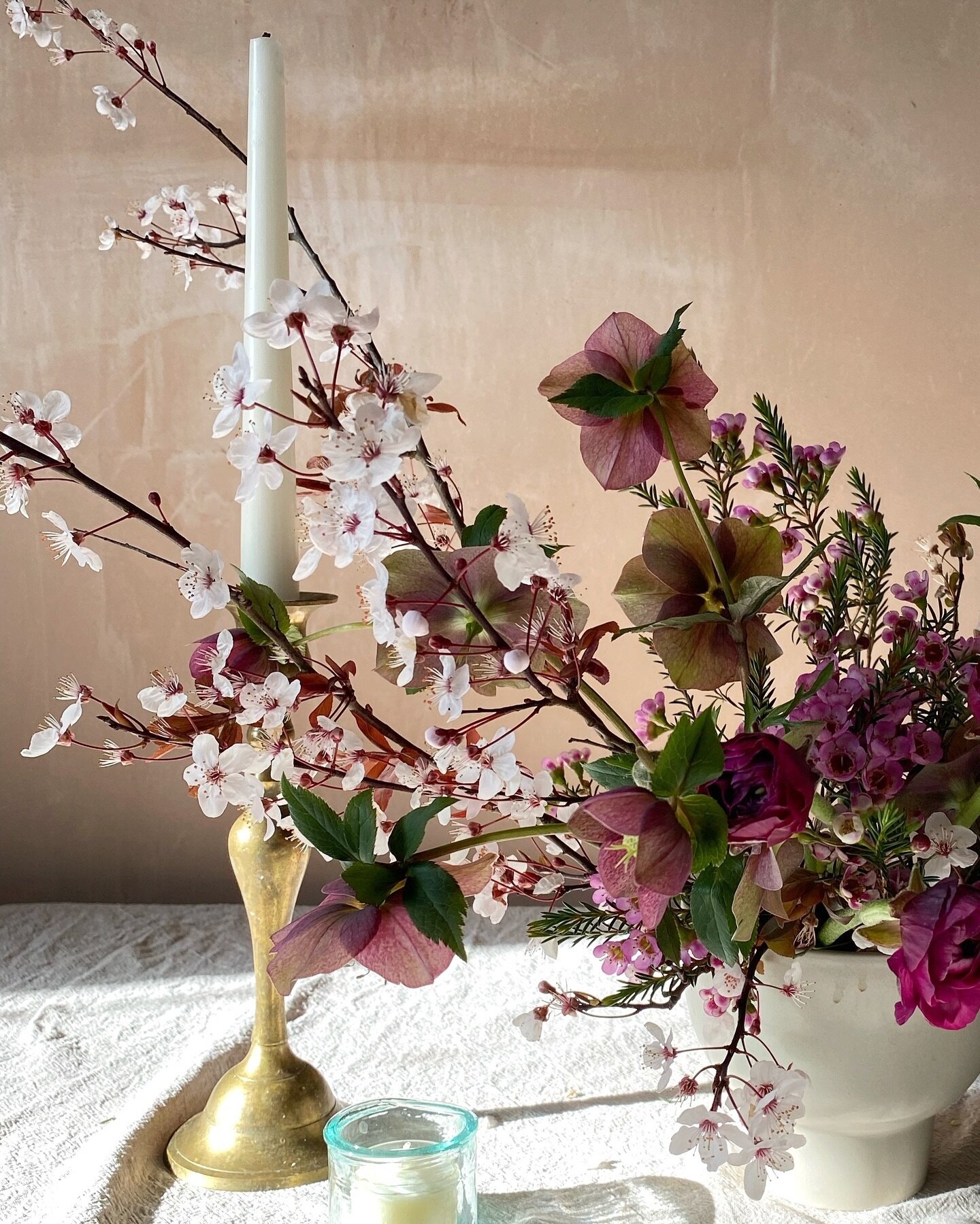 Who says you can&rsquo;t go for rich colours in spring? I love this mix of dark Hellebores, ranunculus and blossom. The dark centres of this wild cherry blossom links perfectly with the darker tones of the other flowers in the design.