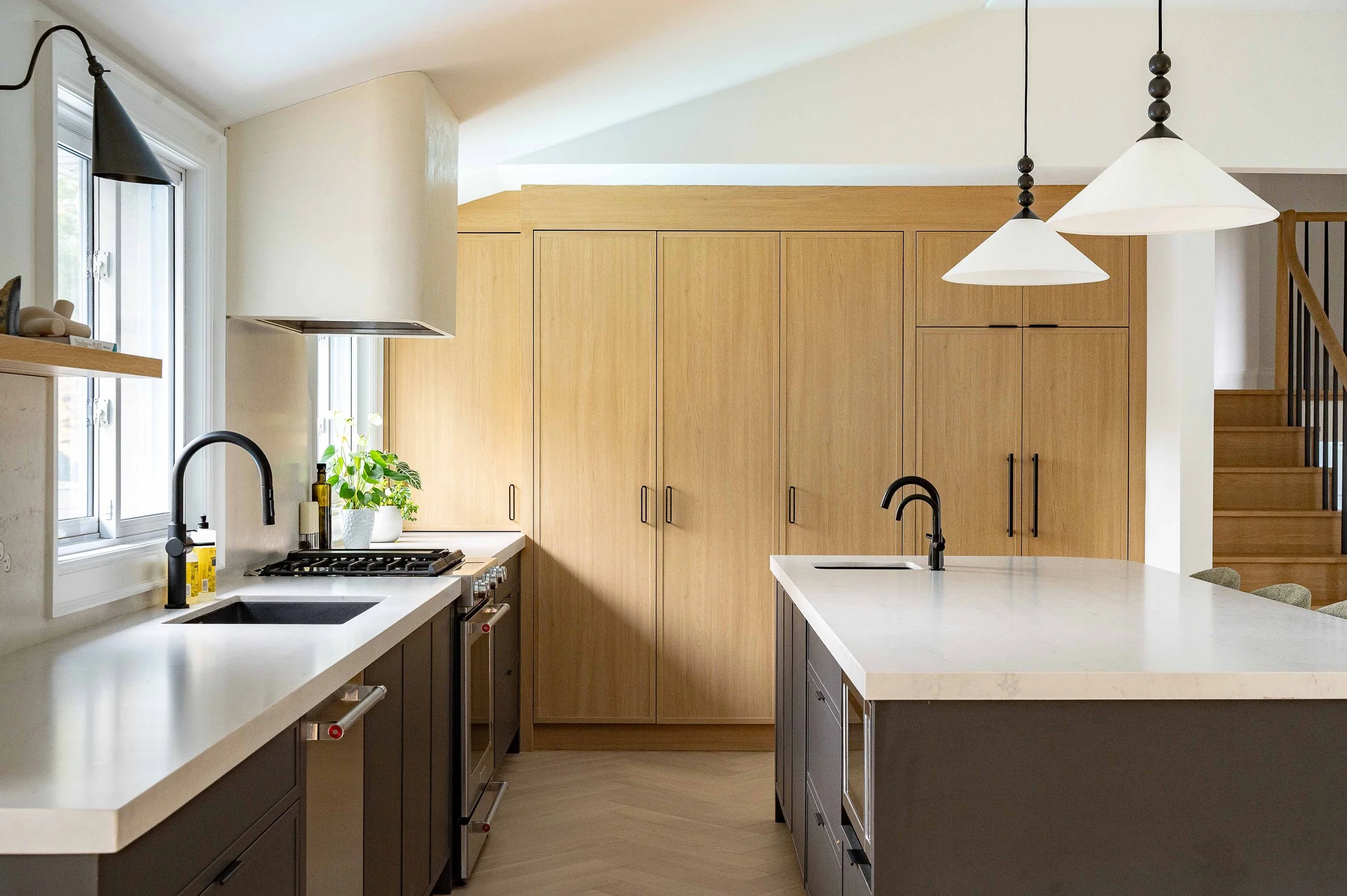 custom kitchen design with white oak and black cabinets