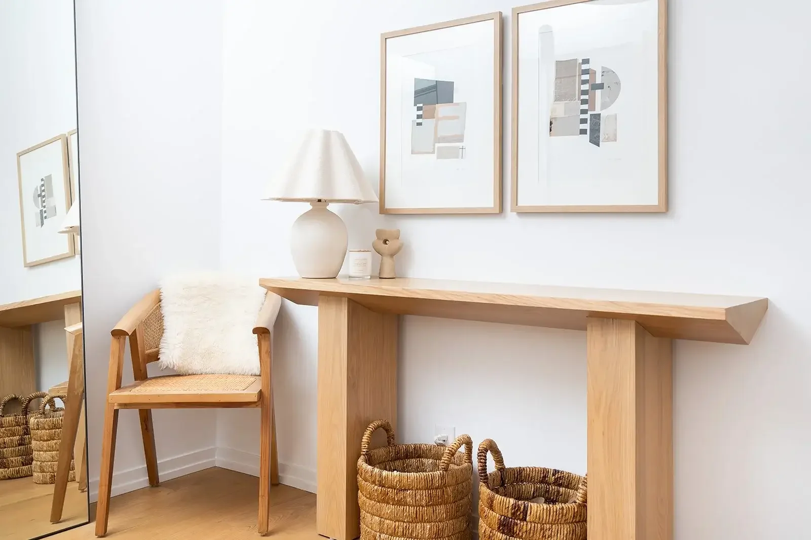 Minimalist foyer interior design in King Street East Toronto featuring wooden console table, neutral décor, and modern entryway styling