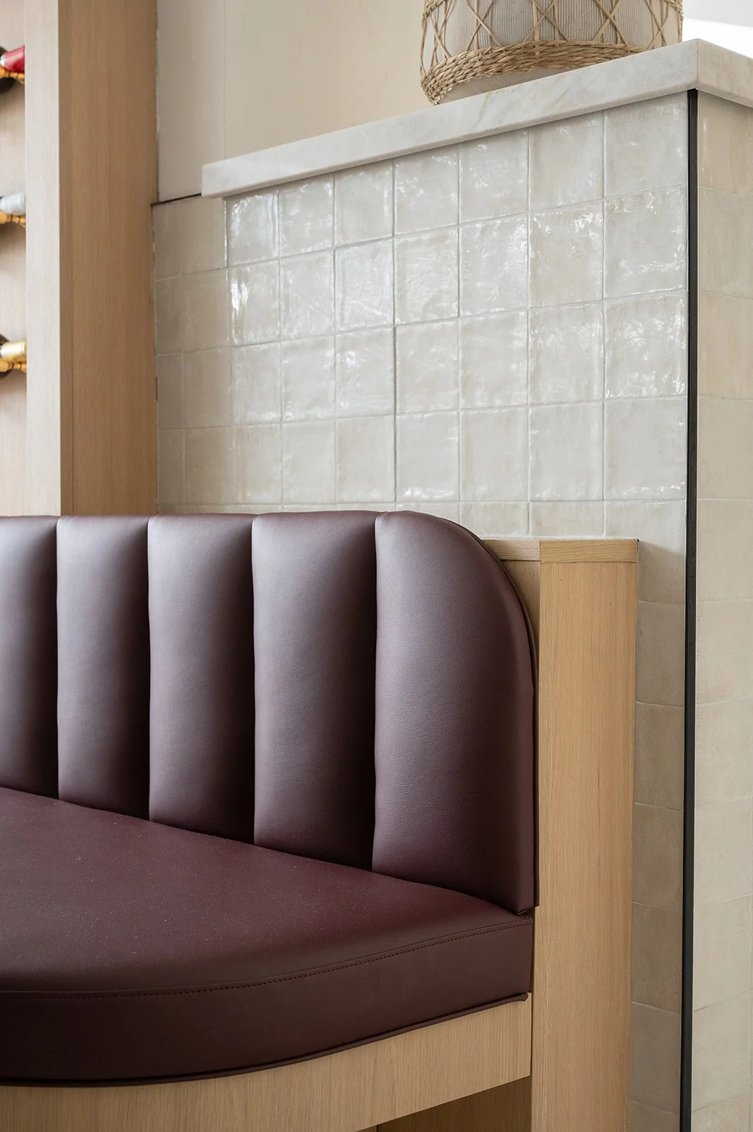 Banquette burgundy red channeled back rest
