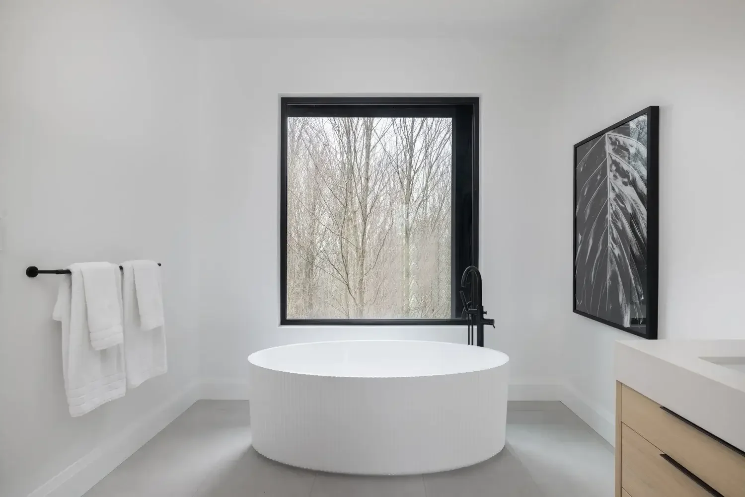 modern bathroom with white walls and neutral palette