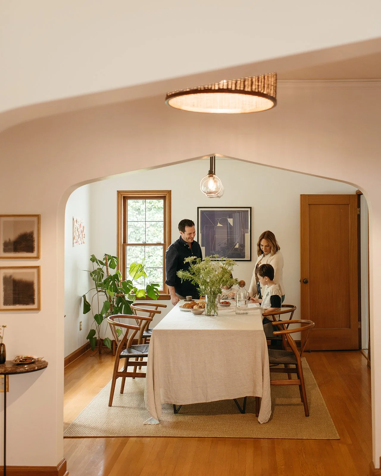 Alison Derse, Realtor Portland Oregon - Alison and family around her beautiful, mid-century modern kitchen table