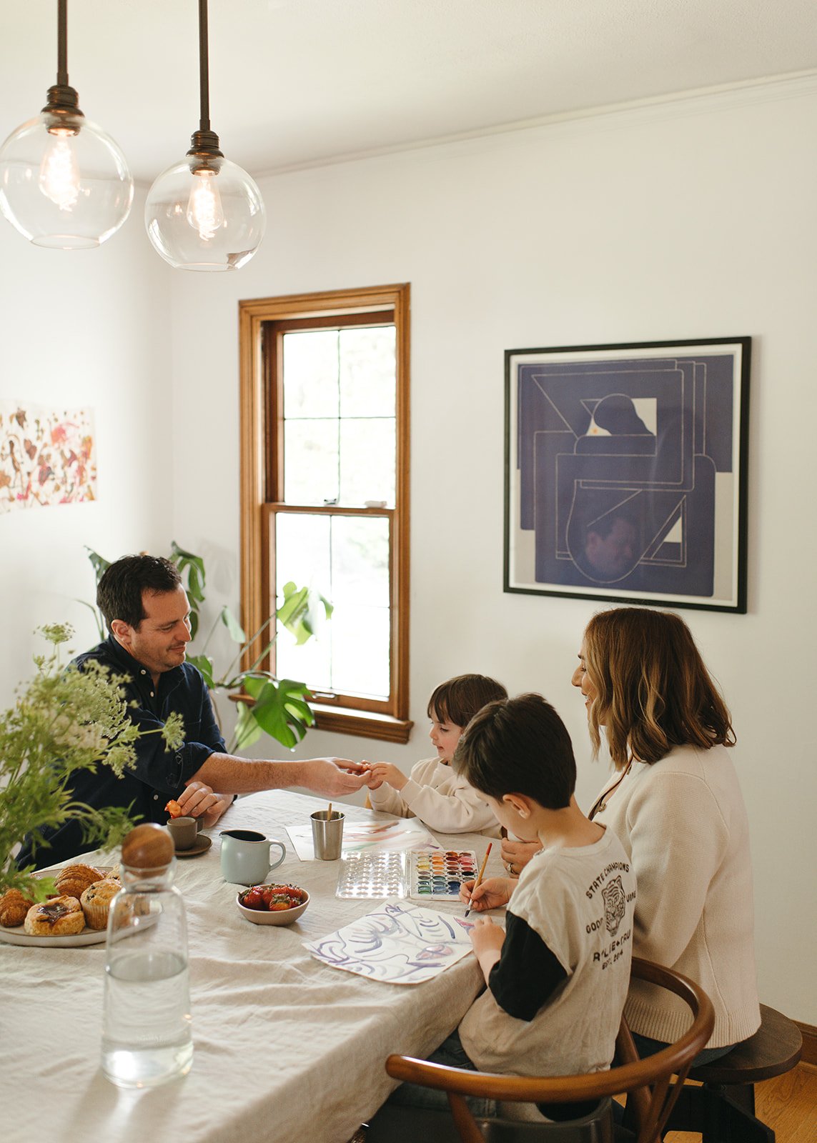 Alison Derse, Realtor Portland Oregon - Alison and her family huddled around a table while her kids paint