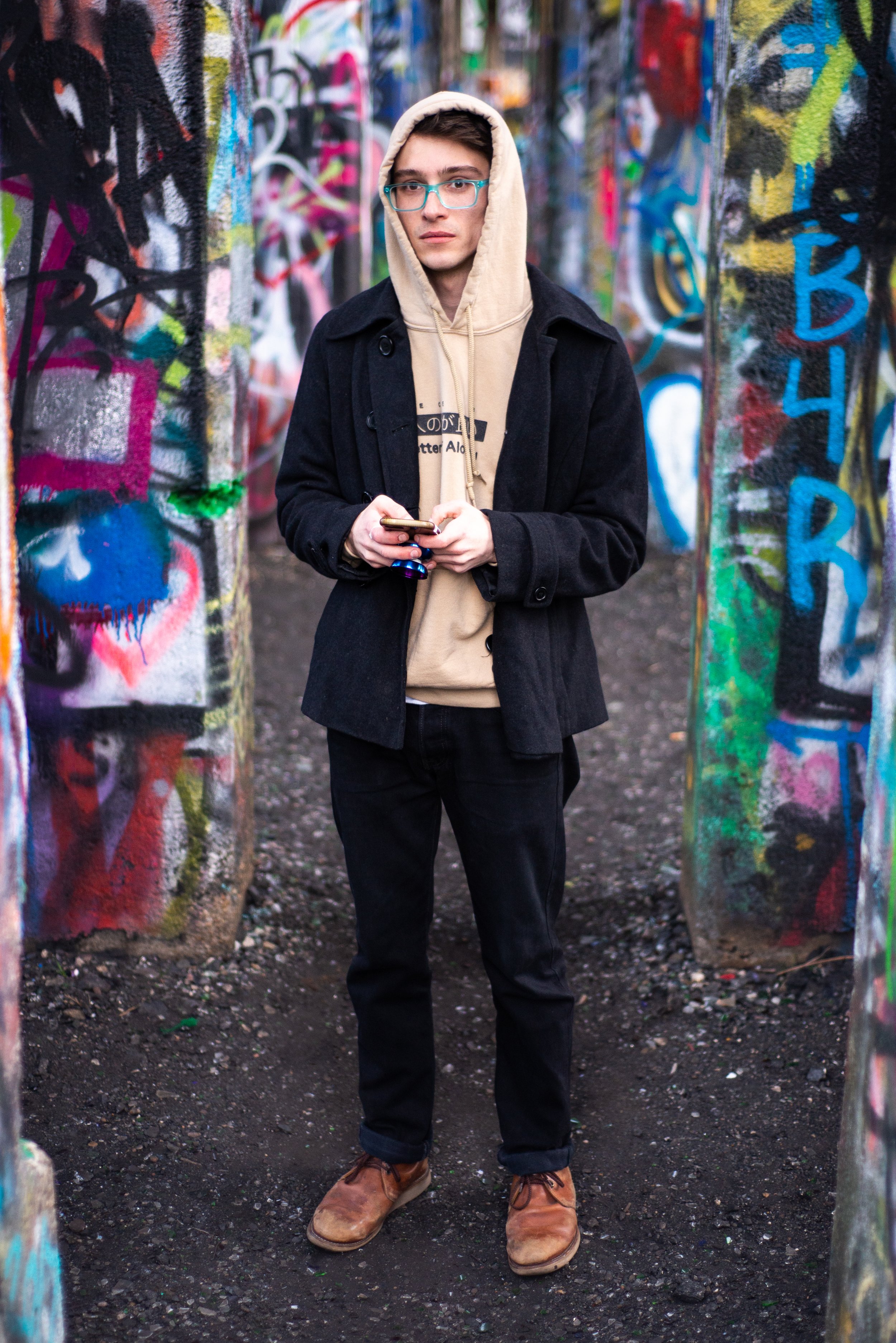 Tyler Severance checking his phone, Philadelphia, 2020