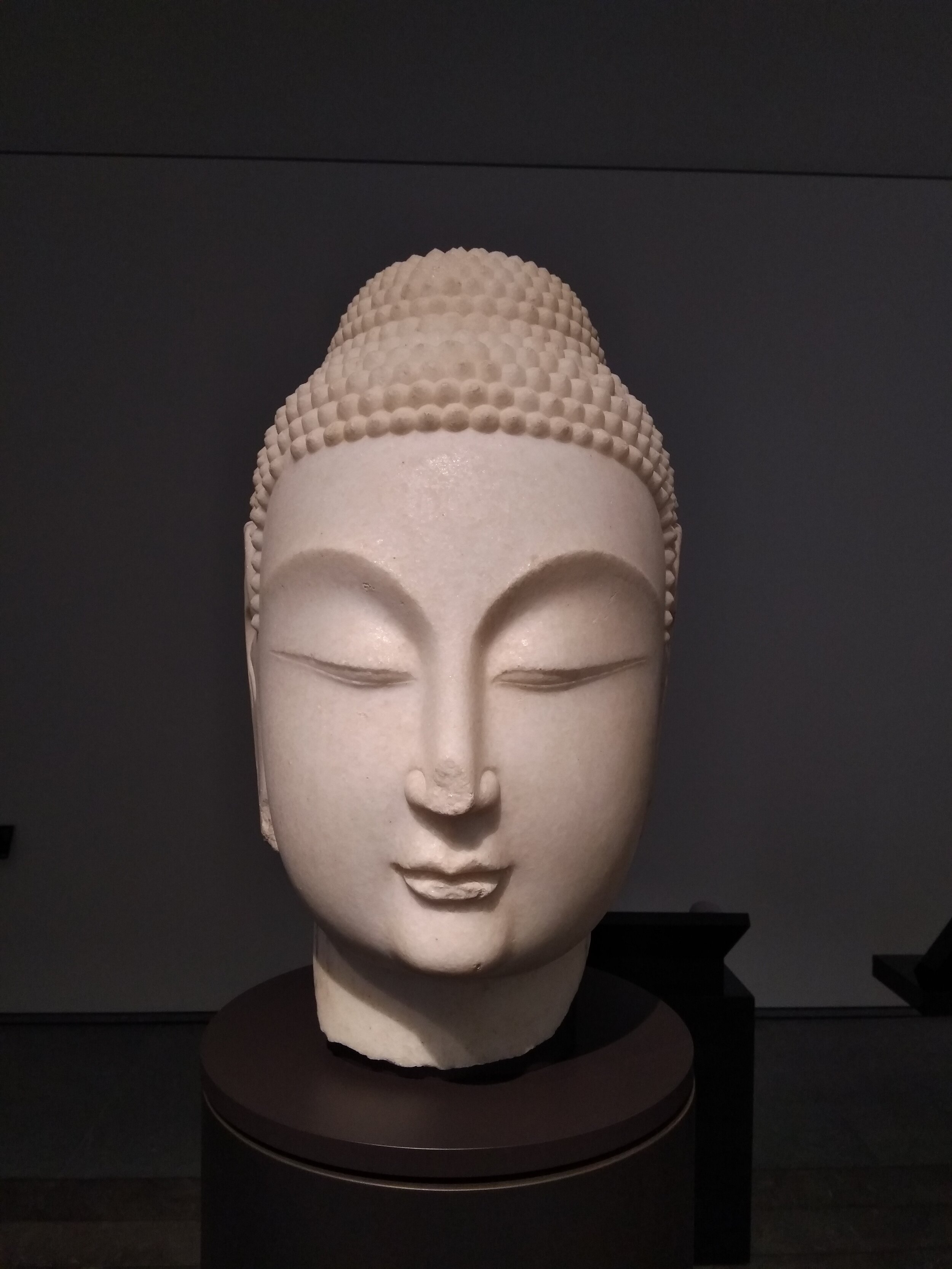 6 Buddha head, Northern China, 400-500.jpg