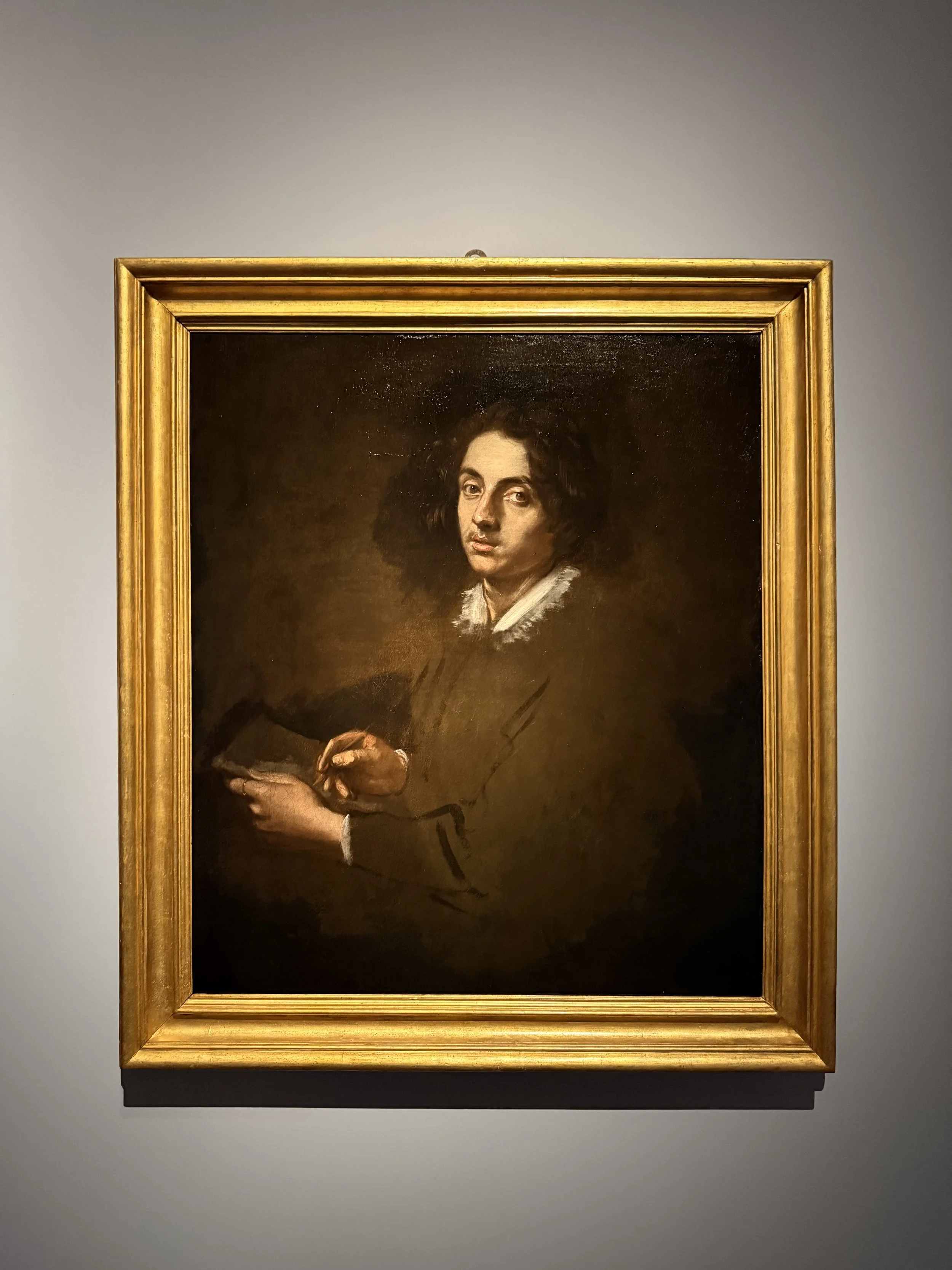 Simone Cantarini, Autoritratto con taccuino e lapis, Self-Portrait with notebook and pencil.