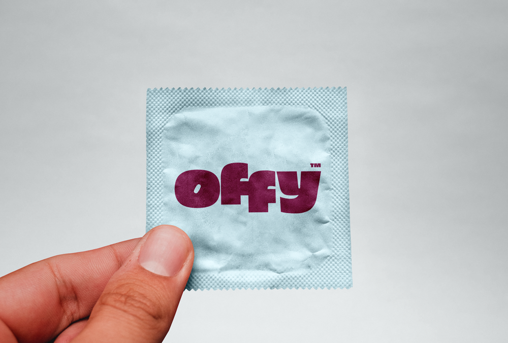Free-Condom-in-Hand-Mockup.png